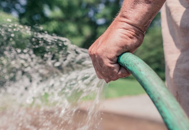 Man Holding water pipe