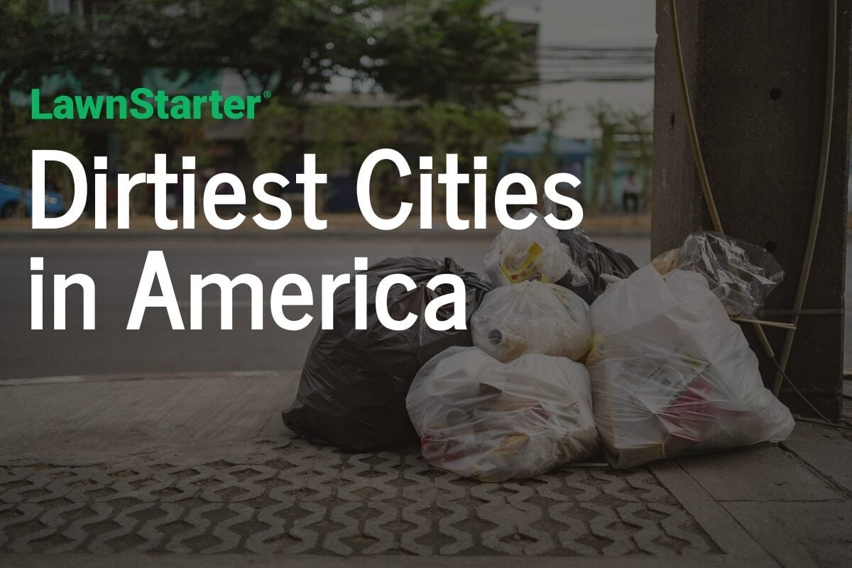 Trash bags lying in the street with the title: LawnStarter Dirtiest Cities in America