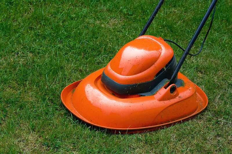 Garden hover lawn mower on grass 